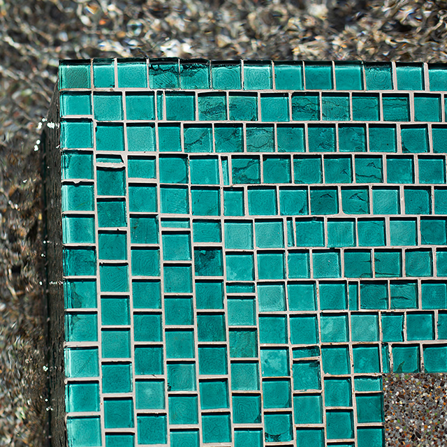 turquoise tile and pool water
