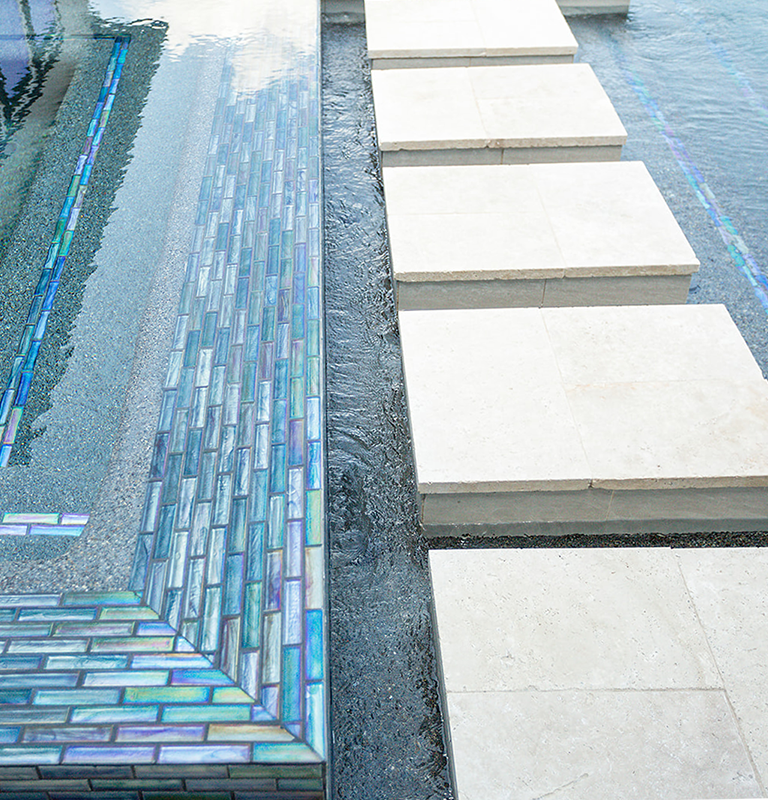 up close view of tilework and concrete stepping stones