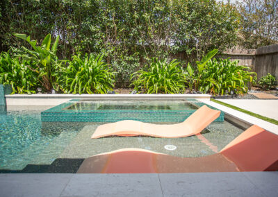 katy pool builders pool with orange loungers