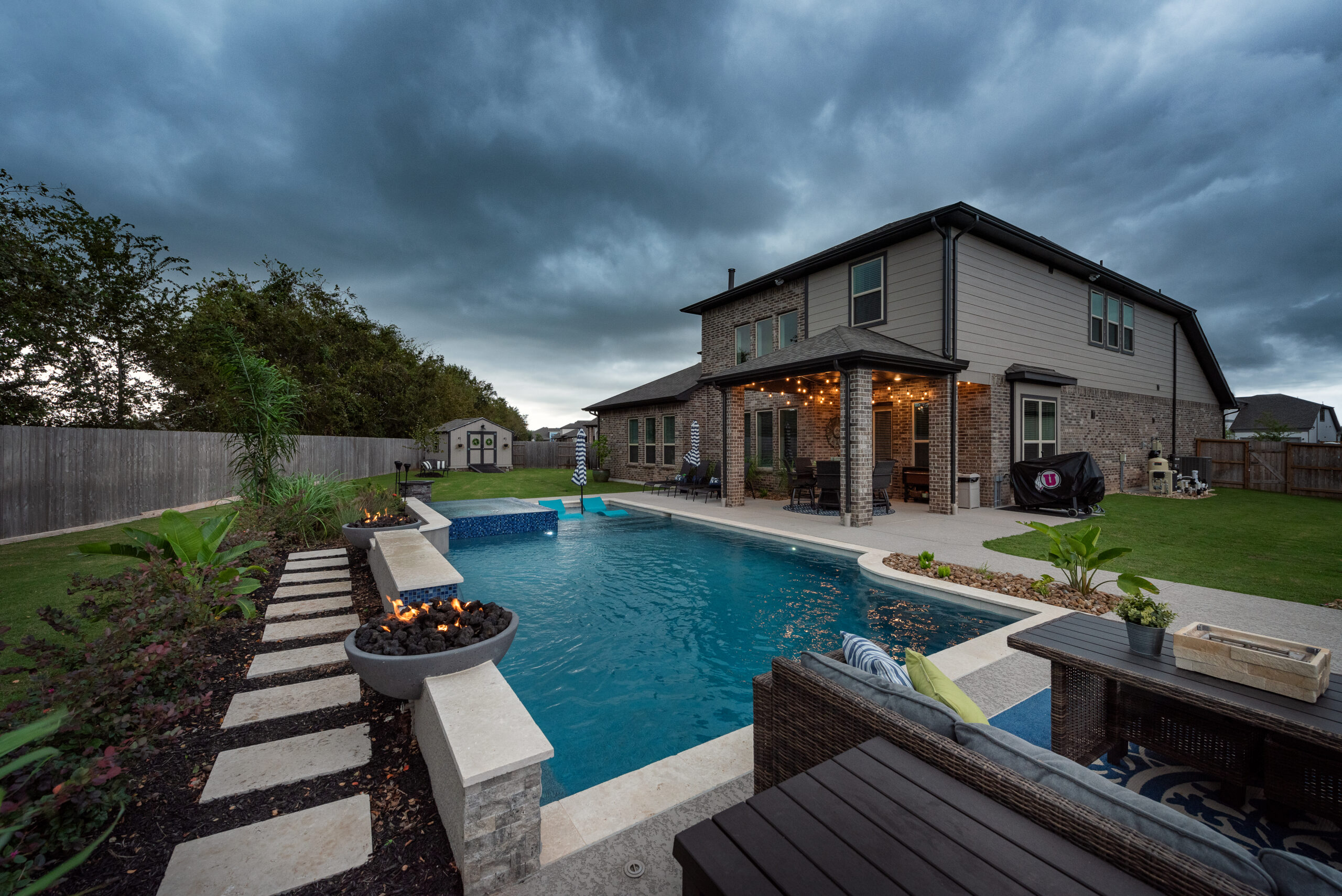 houston pool contractor - pool at dusk