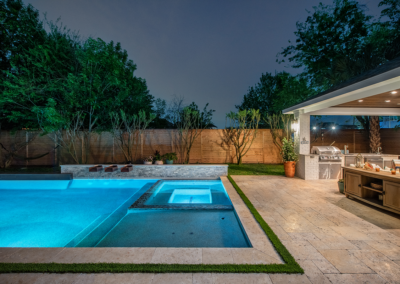 a pool and outdoor kitchen in houston