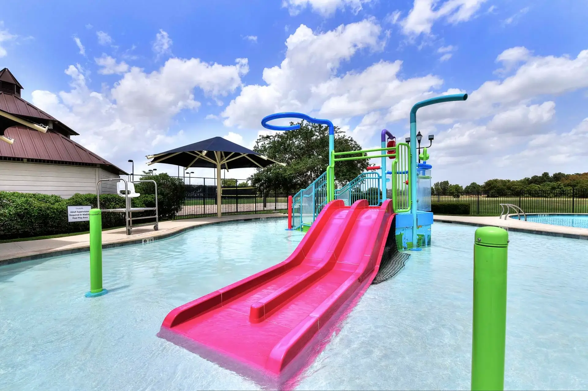 Commercial Pool Contractor Houston — A Water Park with a Slide.