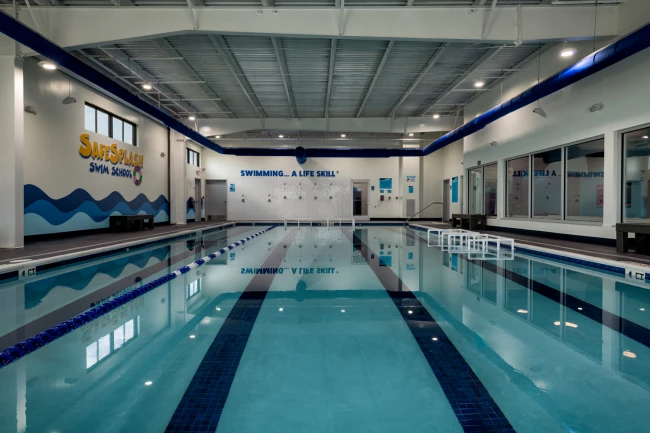 Wide view of indoor lap pool built by Sunset Pools in Cypress TX